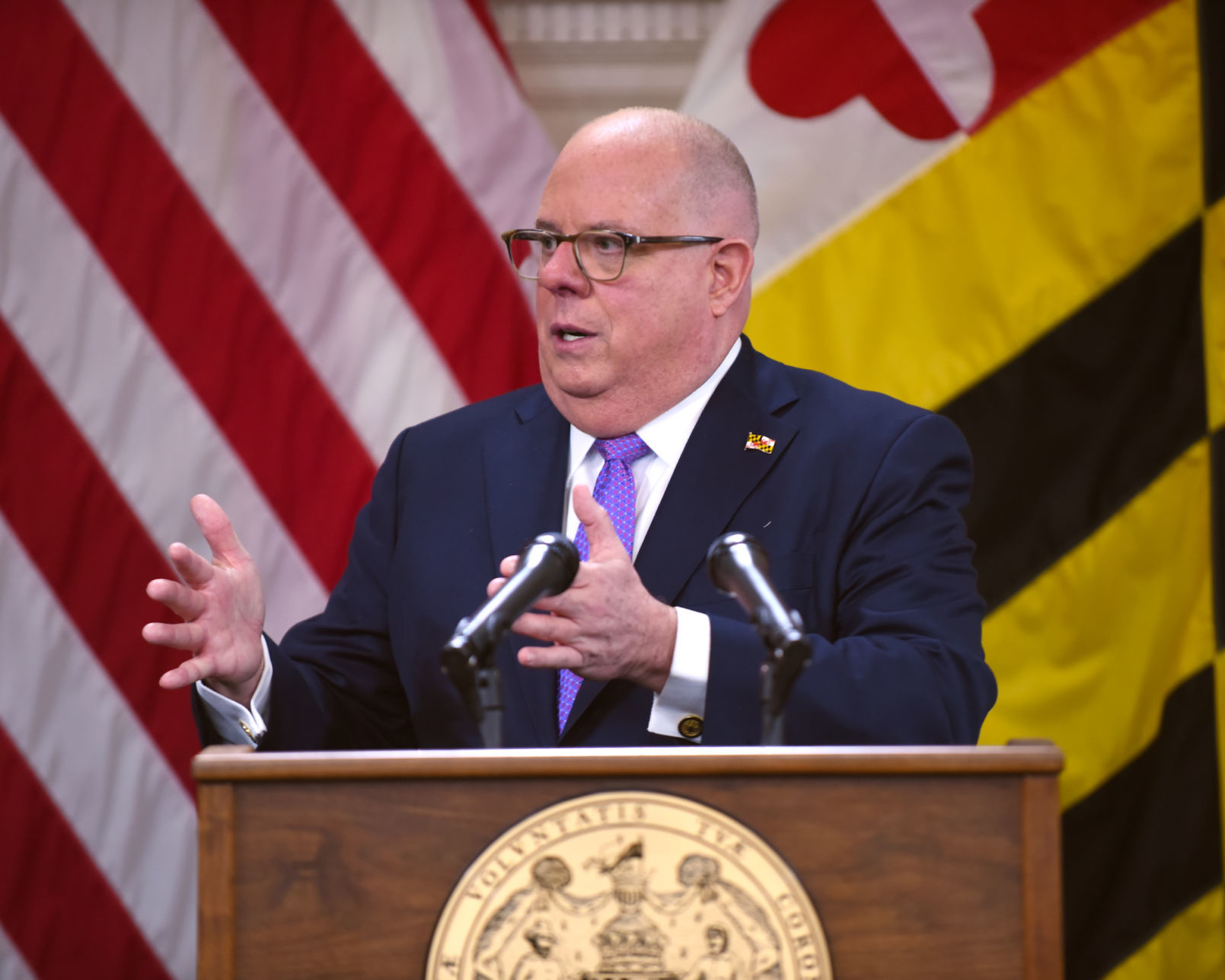 Reopen rally shows rift between Harris, Hogan